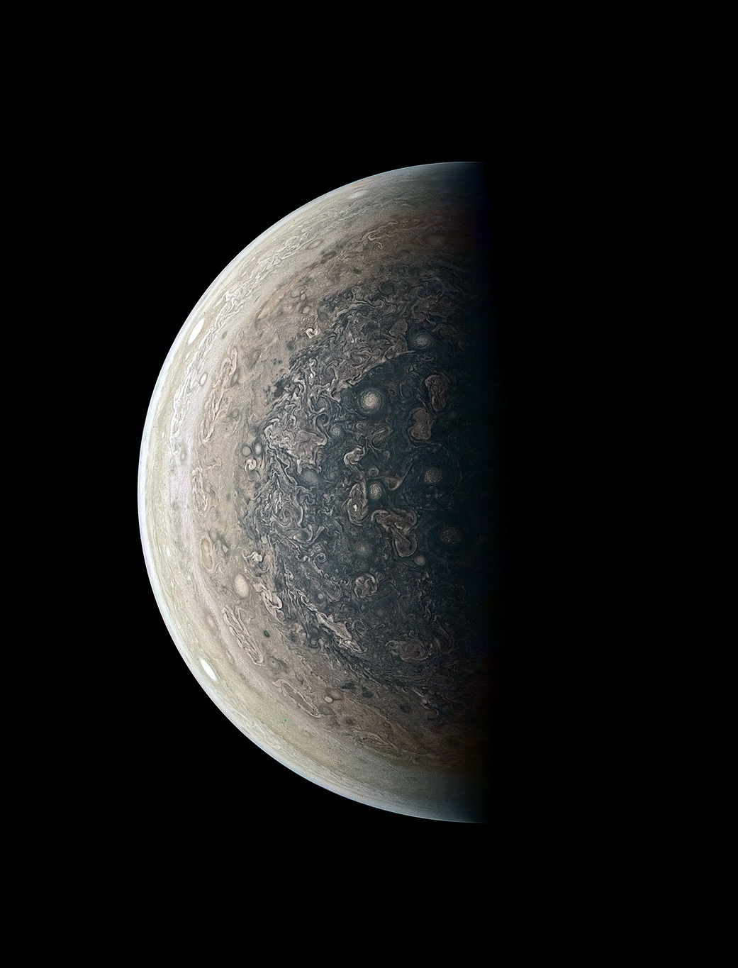 Jupiter's South Pole Swirls with Cyclones in Stunning NASA Photo